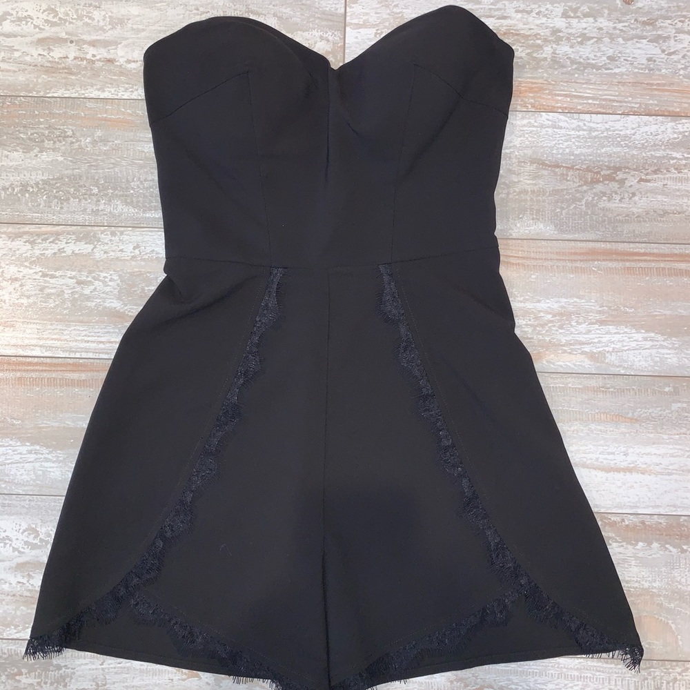 Like new! Bebe Black Strapless Romper - Picture 1 of 6